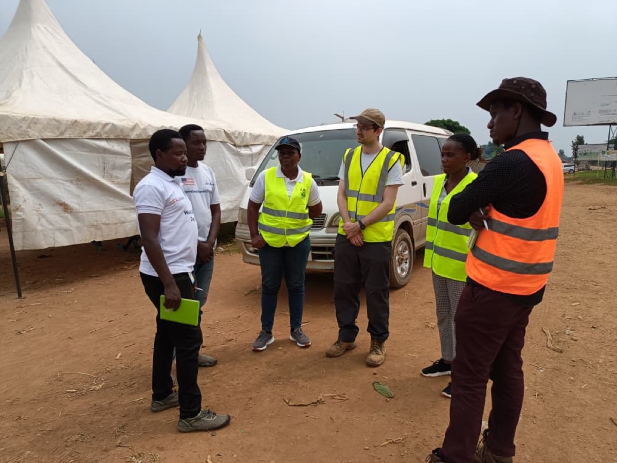 Field team briefing at Rwamwanja Refugee Settlement