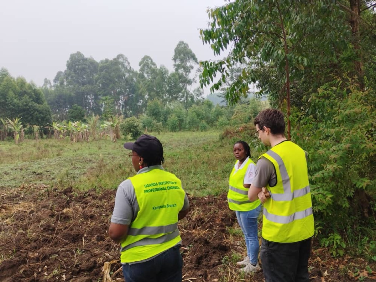 UIPE engineers conducting on-site infrastructure survey at Rwamwanja host community